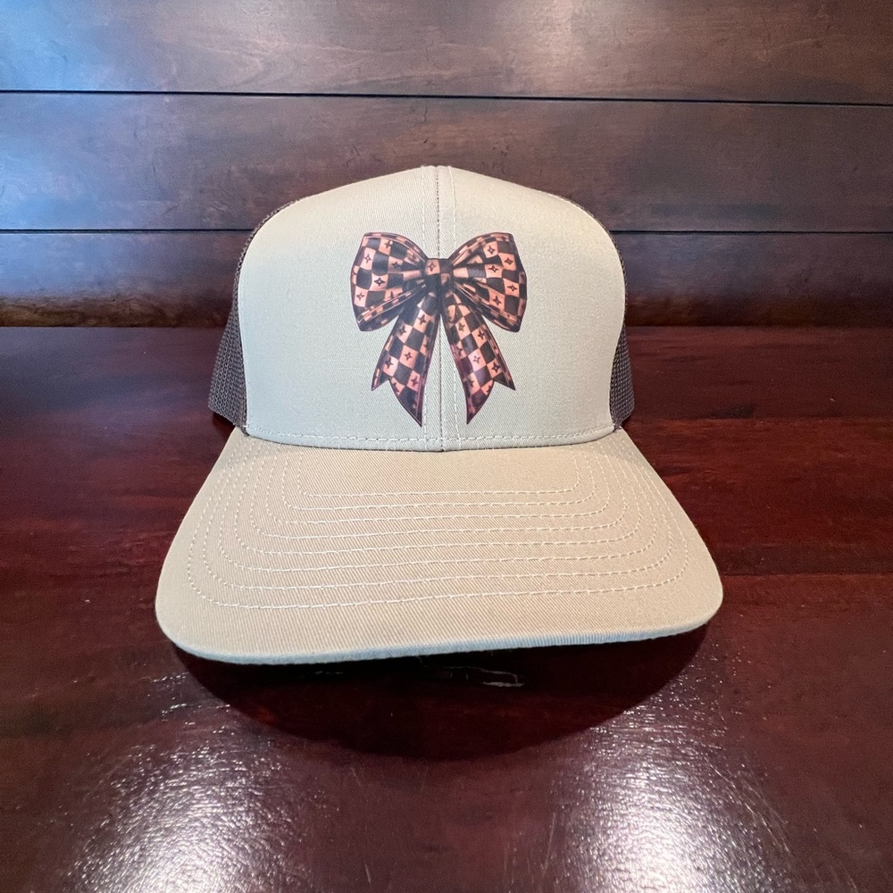 Brown tan trucker hat with brown bow